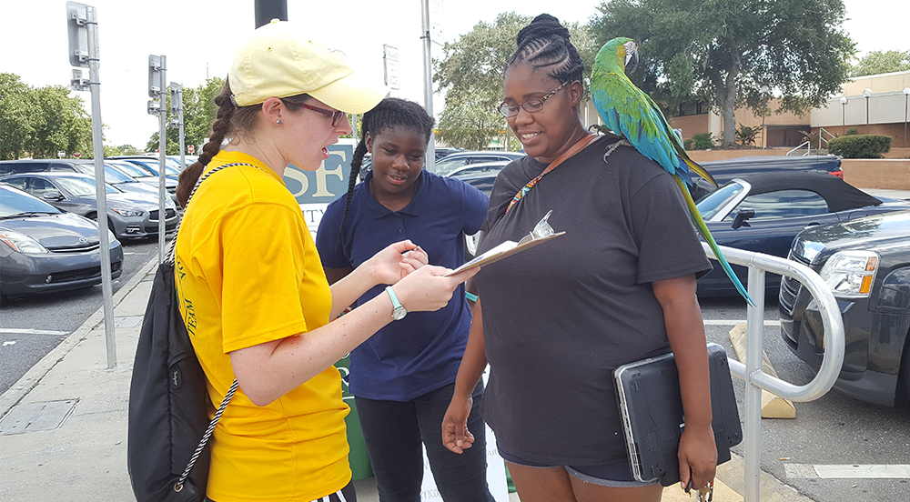 Former USF geosciences graduate student Michelle Saunders surveys individuals evacuating during Hurricane Irma in 2017