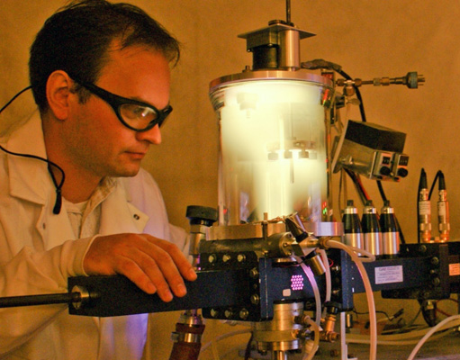 Microwave plasma-assisted spray deposition system