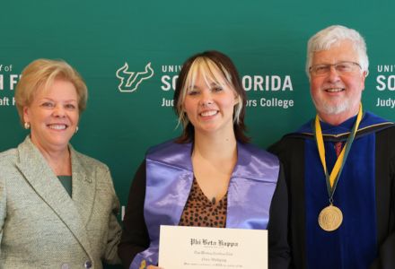 Nora Wolfgang posing at the Phi Beta Kappa induction ceremony with Rhea Law and Dean Adams