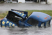 An antique truck is swallowed by Hurricane Idalia’s storm surge in Horseshoe Beach on Florida’s Big Bend Wednesday in this Aug 30, 2023, photo. A new study led by researchers at the University of South Florida’s St. Petersburg campus has found that Idalia gained strength after passing over a freshwater plume that trapped ocean heat. [ MAX CHESNES, MAX CHESNES | Times ]
