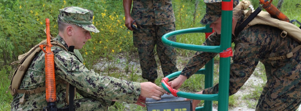 Midshipmen Work Together in a Leadership Reaction Course
